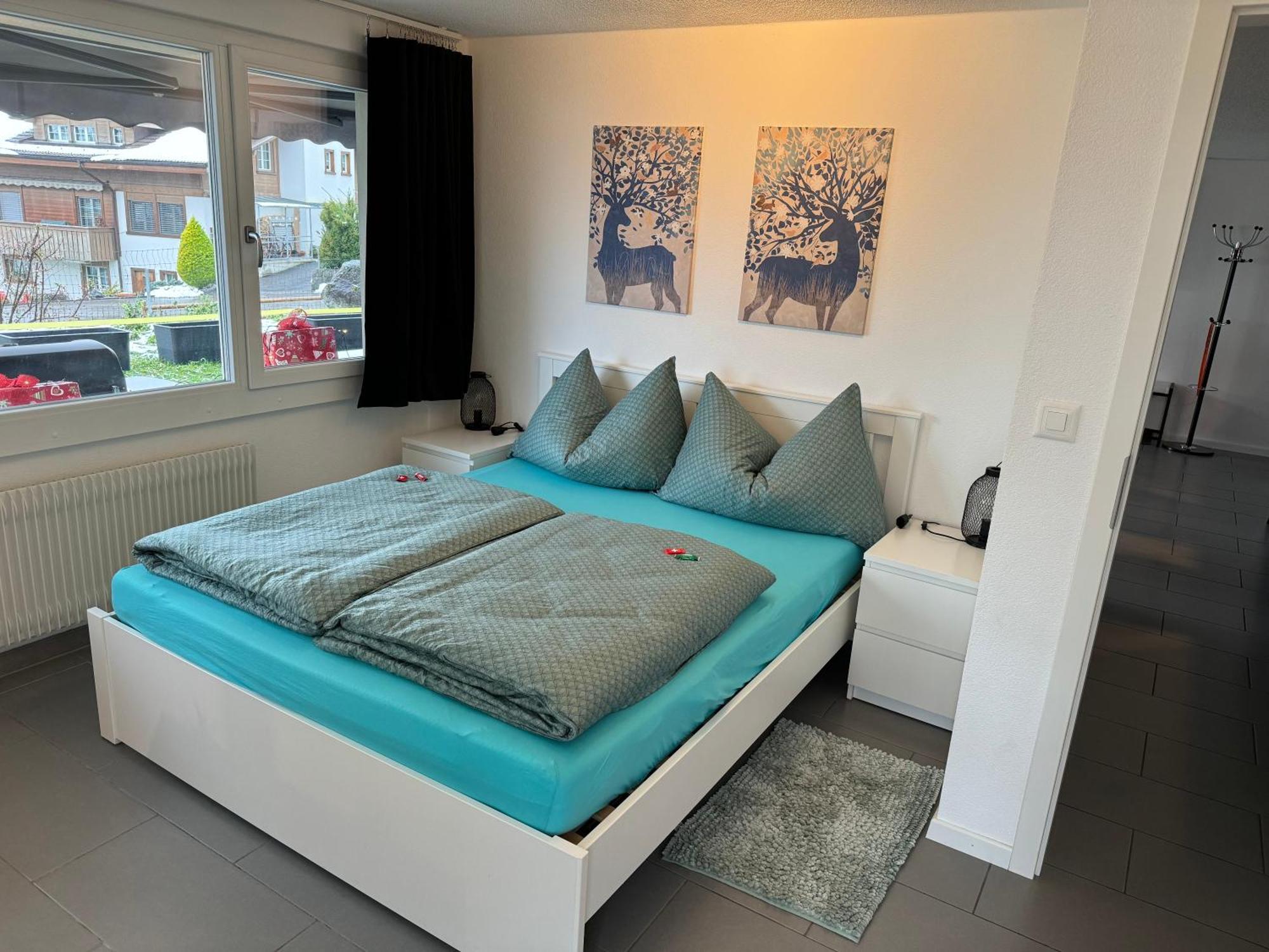 See Und Berge Garden Faulensee Exterior foto